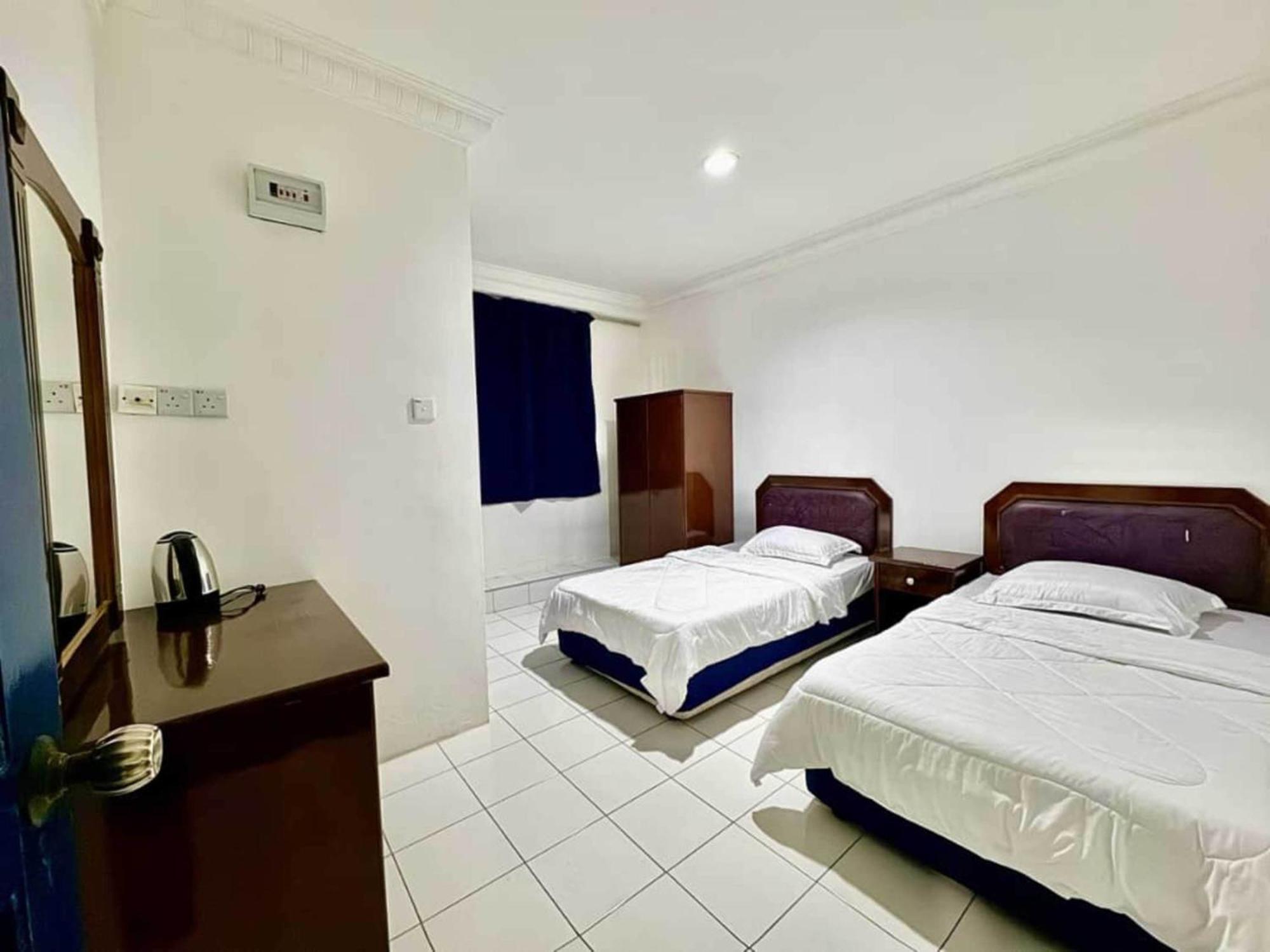 Oyo 91033 Vaigan Hotel บินตูลู ภายนอก รูปภาพ